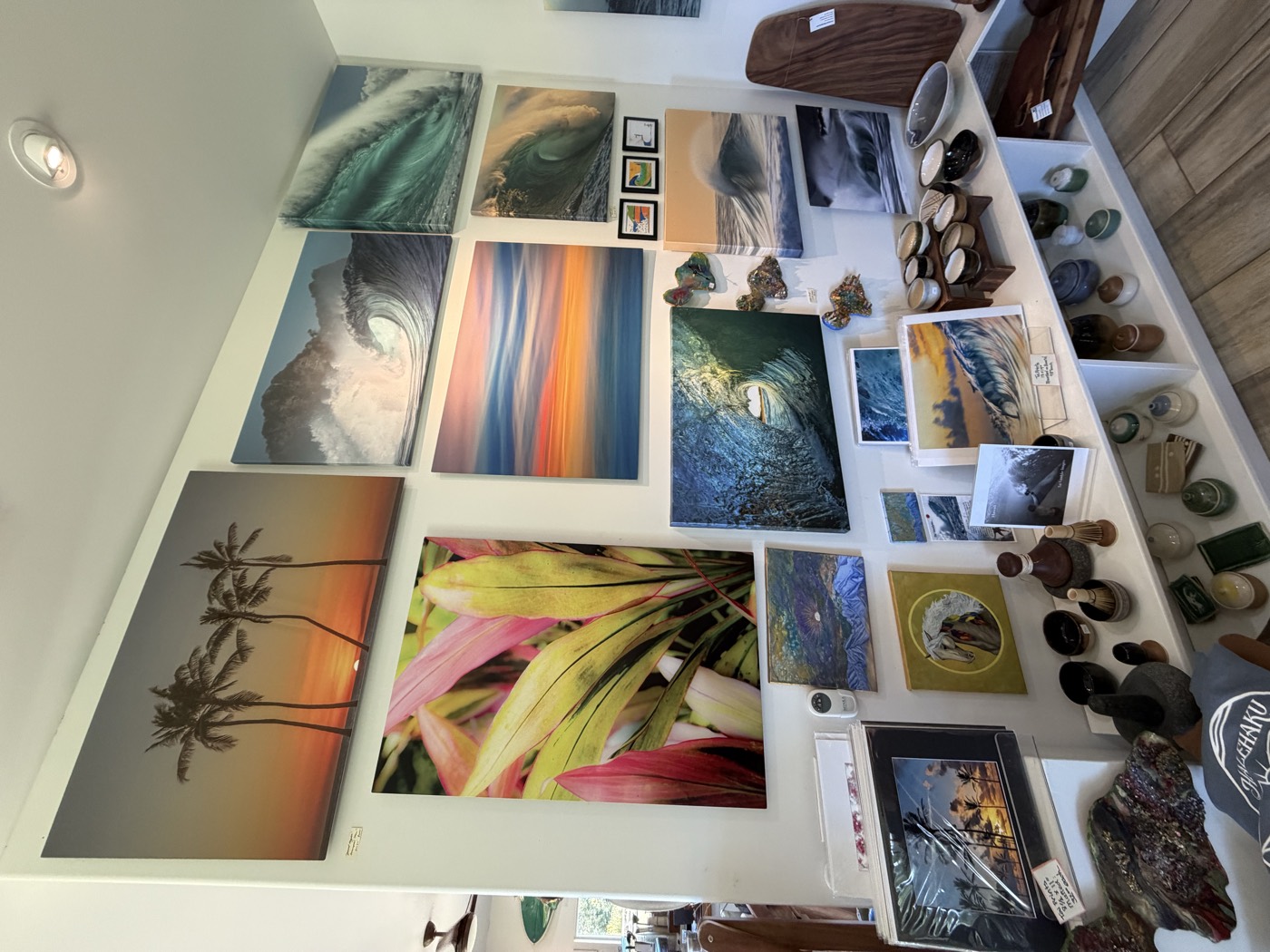 Wall of canvas prints and ceramics